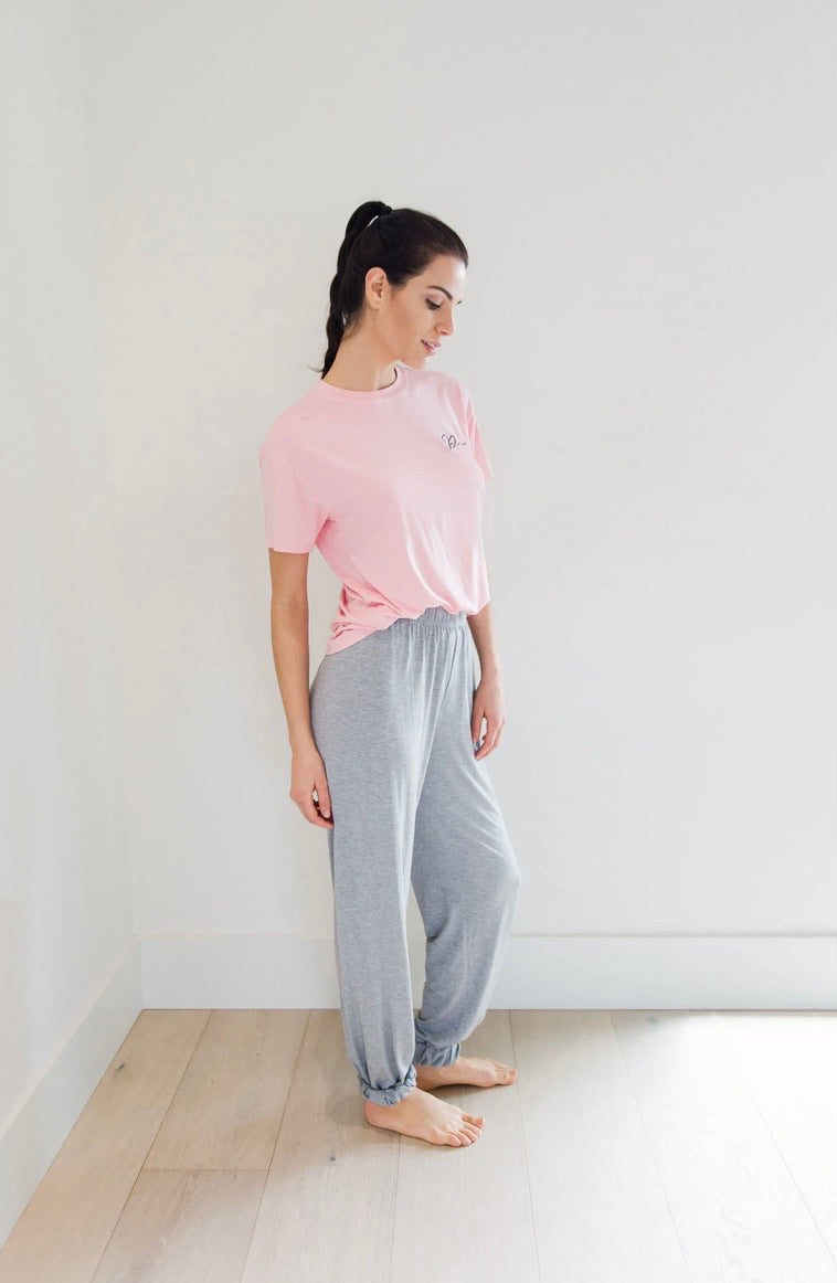 pink short sleeve t-shirt and grey thin pajama pants. Very soft sleep set made by privilage clothing from Vancouver Canada